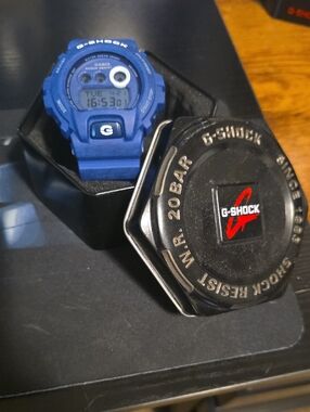 Casio G-Shock Blue Digital Sports Watch with Black Tin Case